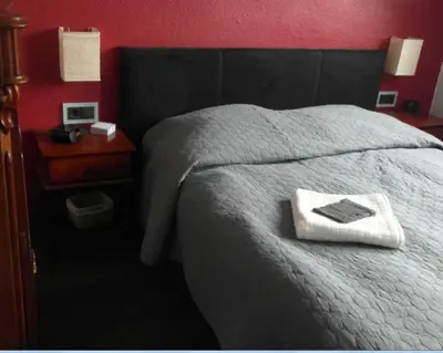 Ein Bett oder Betten in einem Zimmer der Unterkunft Schuster Villa