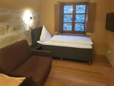 Ein Bett oder Betten in einem Zimmer der Unterkunft Boardinghouse Stadtmauer