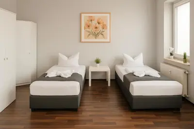 Ein Bett oder Betten in einem Zimmer der Unterkunft SUNNYHOME Monteurwohnungen und Apartments in Schwandorf