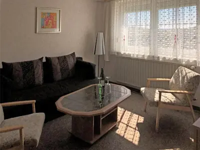 Ein Sitzbereich in der Unterkunft Gartenwohnung Gößweinstein