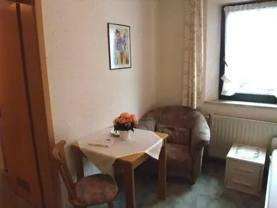 Ein Sitzbereich in der Unterkunft Gasthof Alte Post