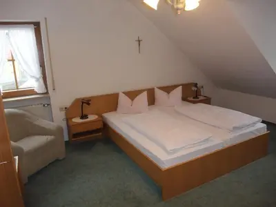 Ein Bett oder Betten in einem Zimmer der Unterkunft Gasthof Alte Post