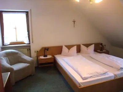 Ein Bett oder Betten in einem Zimmer der Unterkunft Gasthof Alte Post