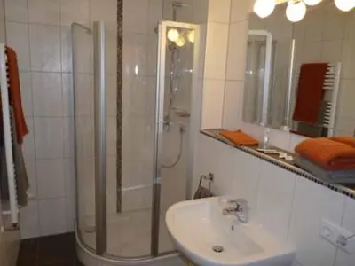 Ein Badezimmer in der Unterkunft Cafe und Pension Ringer