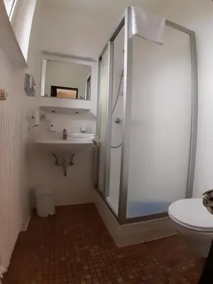 Ein Badezimmer in der Unterkunft Hotel Promenade