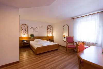 Ein Bett oder Betten in einem Zimmer der Unterkunft Fränkischer Hof