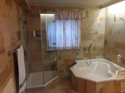 Ein Badezimmer in der Unterkunft Hotel Feiler