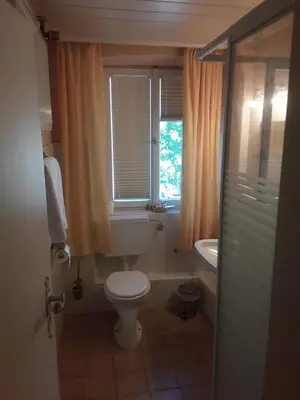 Ein Badezimmer in der Unterkunft Hotel Feiler