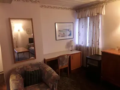 Ein Sitzbereich in der Unterkunft Hotel Feiler