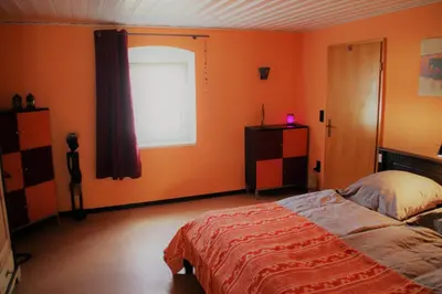 Ein Bett oder Betten in einem Zimmer der Unterkunft Ferienwohnung Frankenwald