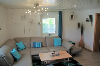 Ein Sitzbereich in der Unterkunft Ferienwohnung Frankenwald