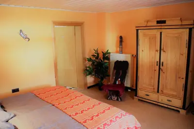 Ein Bett oder Betten in einem Zimmer der Unterkunft Ferienwohnung Frankenwald