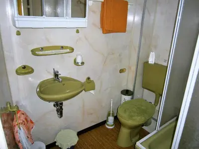 Ein Badezimmer in der Unterkunft Pension Central