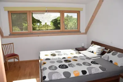 Ein Bett oder Betten in einem Zimmer der Unterkunft Villa Rosa