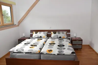 Ein Bett oder Betten in einem Zimmer der Unterkunft Villa Rosa