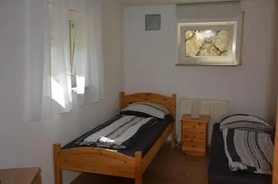 Ein Bett oder Betten in einem Zimmer der Unterkunft Ferienwohnung Christina