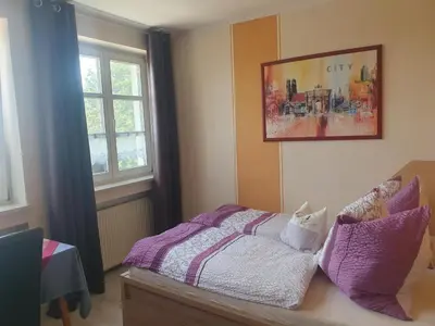 Ein Bett oder Betten in einem Zimmer der Unterkunft Wallfahrts-Gaststätte Heilbrünnl