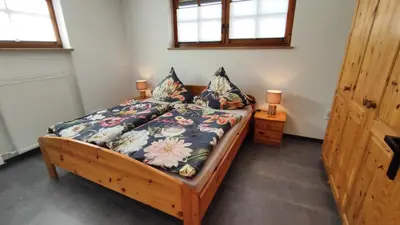 Ein Bett oder Betten in einem Zimmer der Unterkunft FeWo Kreitl