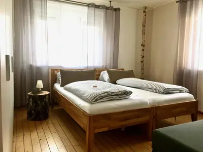 Ein Bett oder Betten in einem Zimmer der Unterkunft Ferienhaus 2 An der Rodach