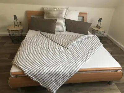 Ein Bett oder Betten in einem Zimmer der Unterkunft Ferienhaus 2 An der Rodach