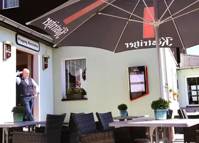 Ein Restaurant oder anderes Speiselokal in der Unterkunft Schwarzes Ross Hotel & Restaurant Oberwiesenthal