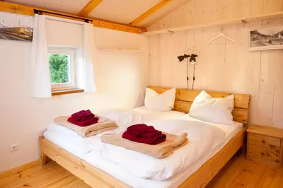 Ein Bett oder Betten in einem Zimmer der Unterkunft Bahnwärterhaus