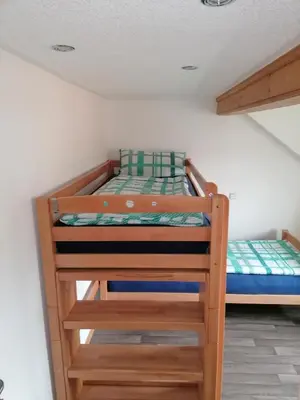 Ein Bett oder Betten in einem Zimmer der Unterkunft Hanslbauernhof