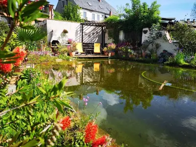 Ein Garten an der Unterkunft Ferienwohnung Blütentraum