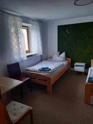 Ein Bett oder Betten in einem Zimmer der Unterkunft Karolingerweg