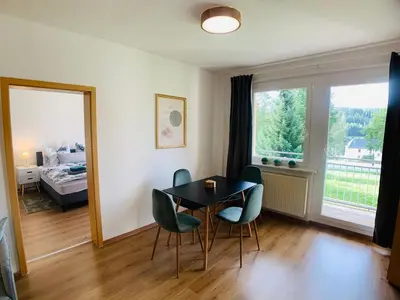 Ein Bett oder Betten in einem Zimmer der Unterkunft Komfortables Apartment in Bad Elster mit Netflix