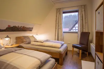 Ein Bett oder Betten in einem Zimmer der Unterkunft Eckerts Quartier