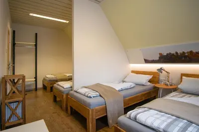 Ein Bett oder Betten in einem Zimmer der Unterkunft Eckerts Quartier