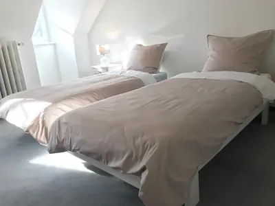 Ein Bett oder Betten in einem Zimmer der Unterkunft Villa Bergmann
