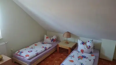 Ein Bett oder Betten in einem Zimmer der Unterkunft Ferienwohnung Däumler