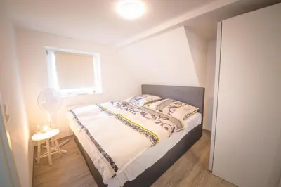 Ein Bett oder Betten in einem Zimmer der Unterkunft Superhost Flat near Opera