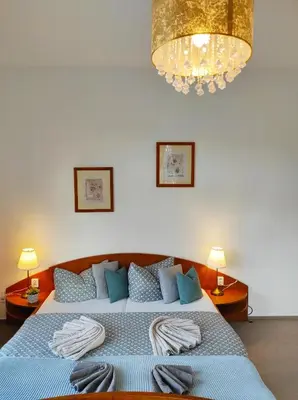 Ein Bett oder Betten in einem Zimmer der Unterkunft Luxury Boutique Pension