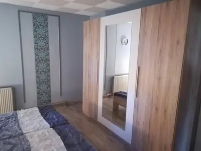 Ein Bett oder Betten in einem Zimmer der Unterkunft Ferienwohnung Preuß