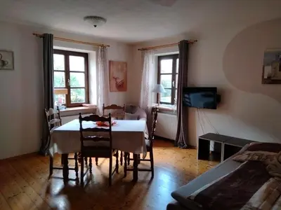 Ein Sitzbereich in der Unterkunft Apartments Angela