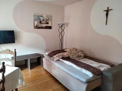 Ein Bett oder Betten in einem Zimmer der Unterkunft Apartments Angela