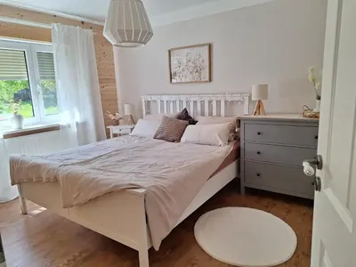 Ein Bett oder Betten in einem Zimmer der Unterkunft Ferienhaus Forstblick