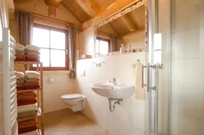 Ein Badezimmer in der Unterkunft Heumanns Blockhaeuser am Wald