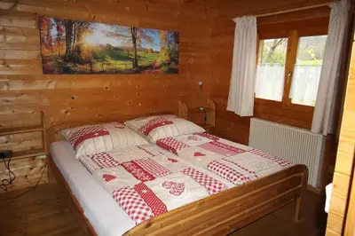 Ein Bett oder Betten in einem Zimmer der Unterkunft Blockhaus Noffke