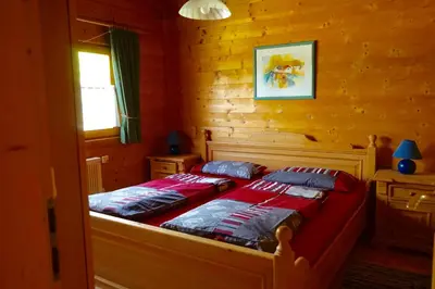 Ein Bett oder Betten in einem Zimmer der Unterkunft Blockhaus Noffke