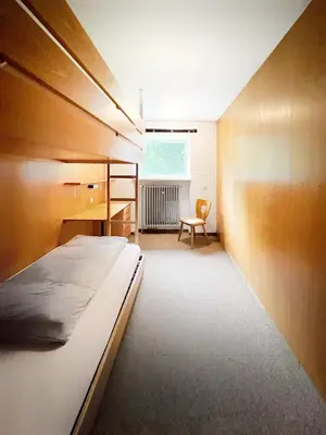 Ein Bett oder Betten in einem Zimmer der Unterkunft WAGNERS Hotel im Fichtelgebirge