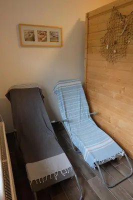 Ein Sitzbereich in der Unterkunft Ferienhaus am Wald