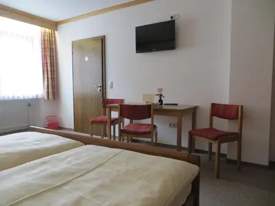 Ein Bett oder Betten in einem Zimmer der Unterkunft Pension Leppert