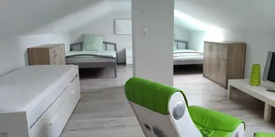 Ein Bett oder Betten in einem Zimmer der Unterkunft Haus Brückelsee