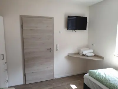 Ein Bett oder Betten in einem Zimmer der Unterkunft Haus Brückelsee