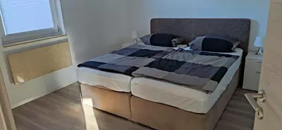 Ein Bett oder Betten in einem Zimmer der Unterkunft Haus Brückelsee