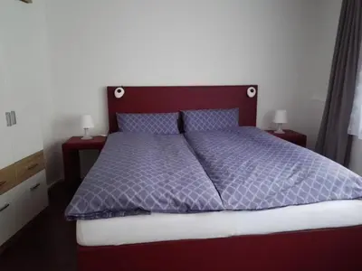 Ein Bett oder Betten in einem Zimmer der Unterkunft Ferienwohnung Delphin